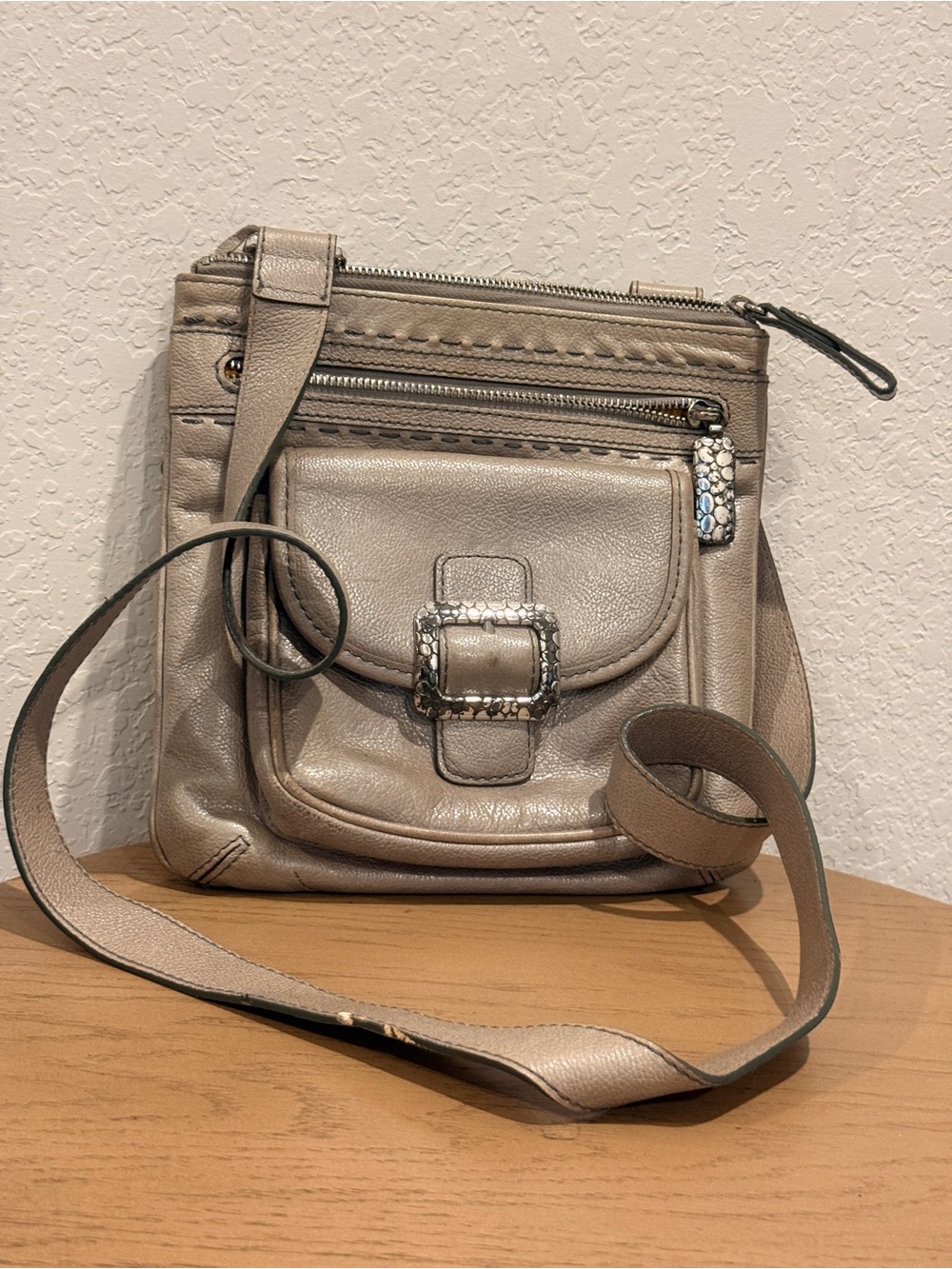 Brighton Metallic Taupe Crossbody with Front Buckle Accent